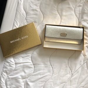 New silver MK wallet